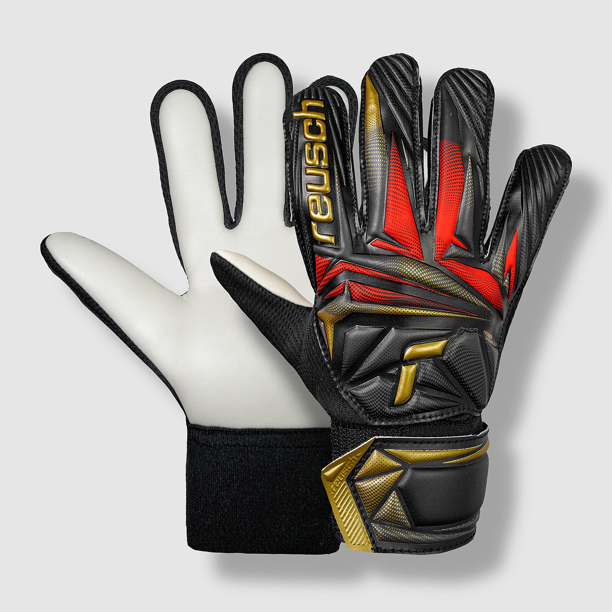 Reusch Kinder Attrakt Starter Solid - Schwarz/Gold/Rot